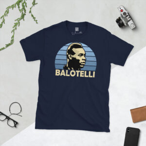 A navy blue T-shirt showcasing a high-contrast illustration of Manchester City hero Mario Balotelli against a blue sunburst backdrop.