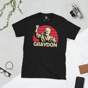 A premium black T-shirt featuring a distressed red sunburst graphic of Walsall legend Ray Graydon holding a trophy, with "GRAYDON" in bold text.