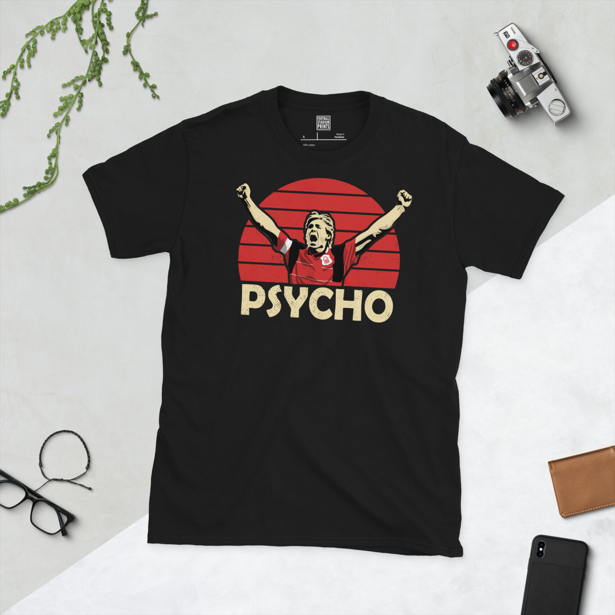 A premium black T-shirt featuring a distressed red sunburst graphic of Nottingham Forest legend Stuart Pearce celebrating with "PSYCHO" in bold lettering.