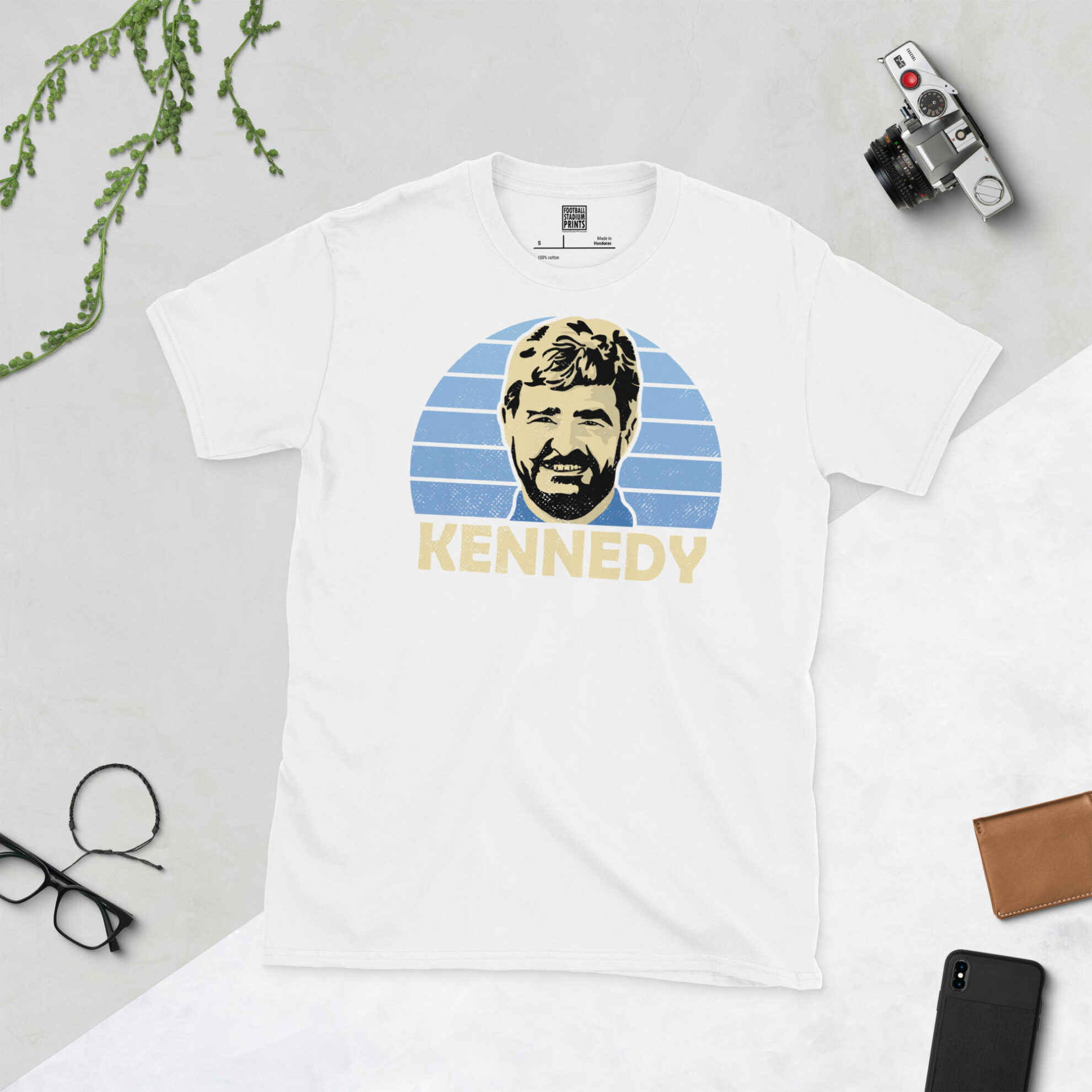 A clean white T-shirt featuring a high-definition distressed print of Forfar hero Stewart Kennedy in a classic blue colourway.