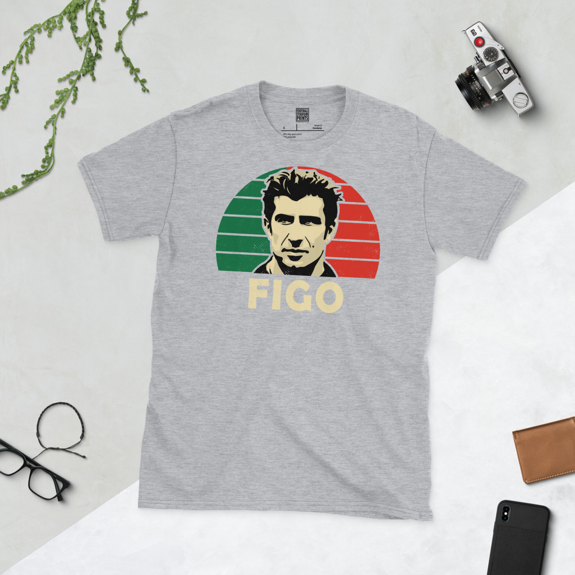 A sports grey T-shirt featuring a bold green and red sunburst design of Luís Figo, finished with his surname in a classic retro font.