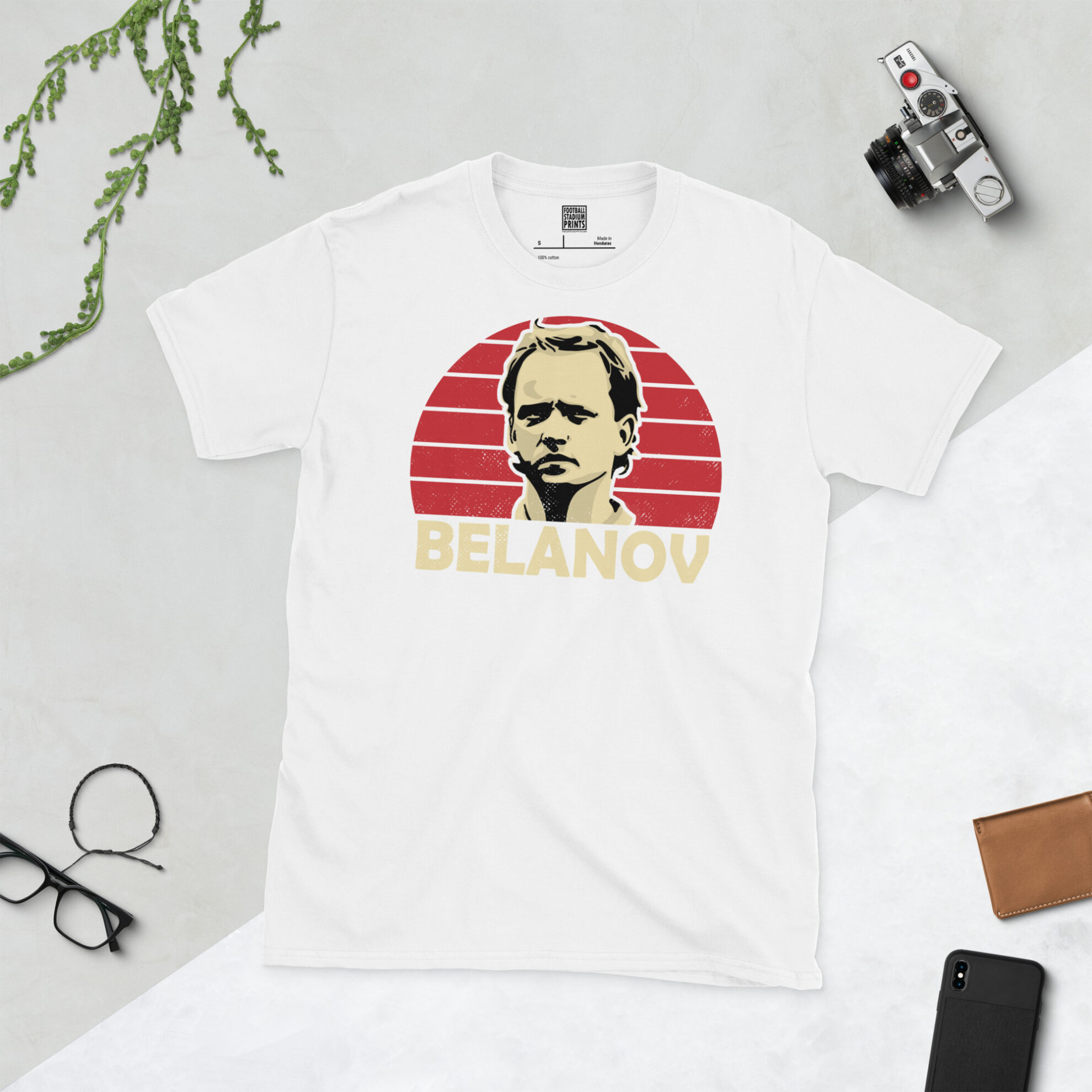 A clean white T-shirt featuring a high-definition distressed print of Ballon d'Or winner Igor Belanov in traditional Soviet red colours.