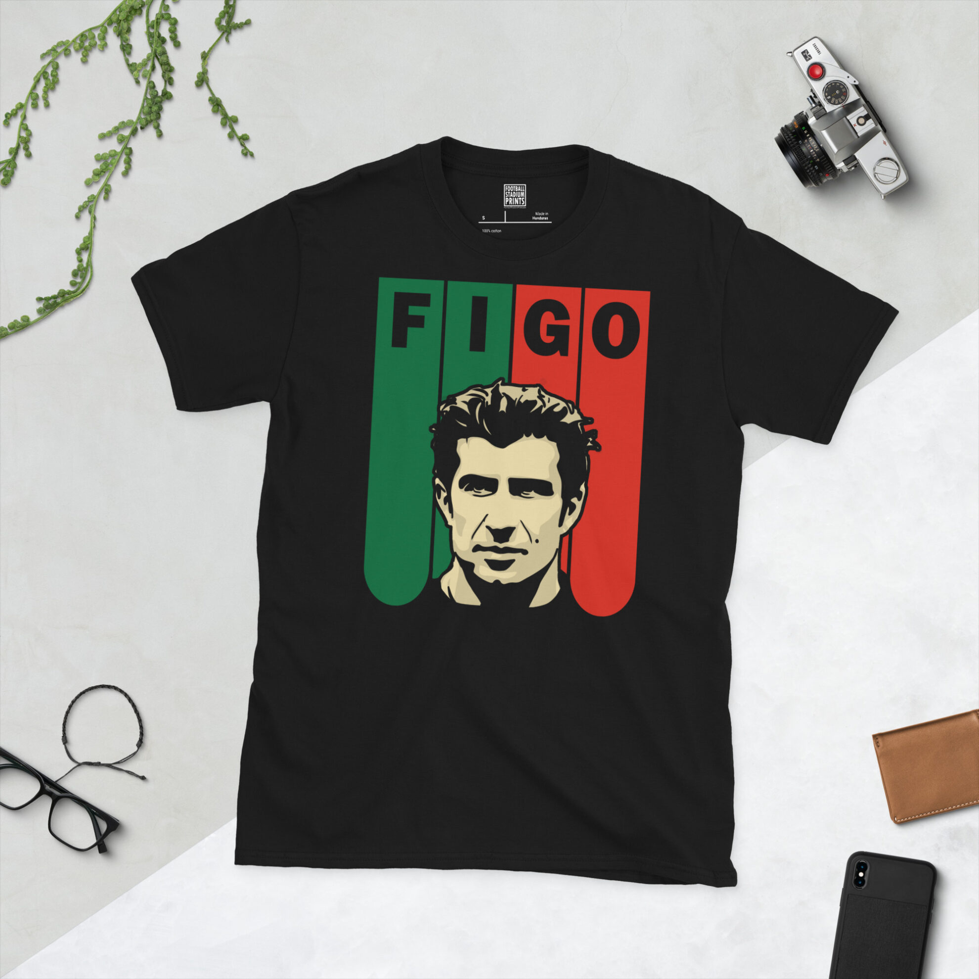 A premium black T-shirt featuring a green and red striped background graphic of Portugal legend Luís Figo with "FIGO" across the top.