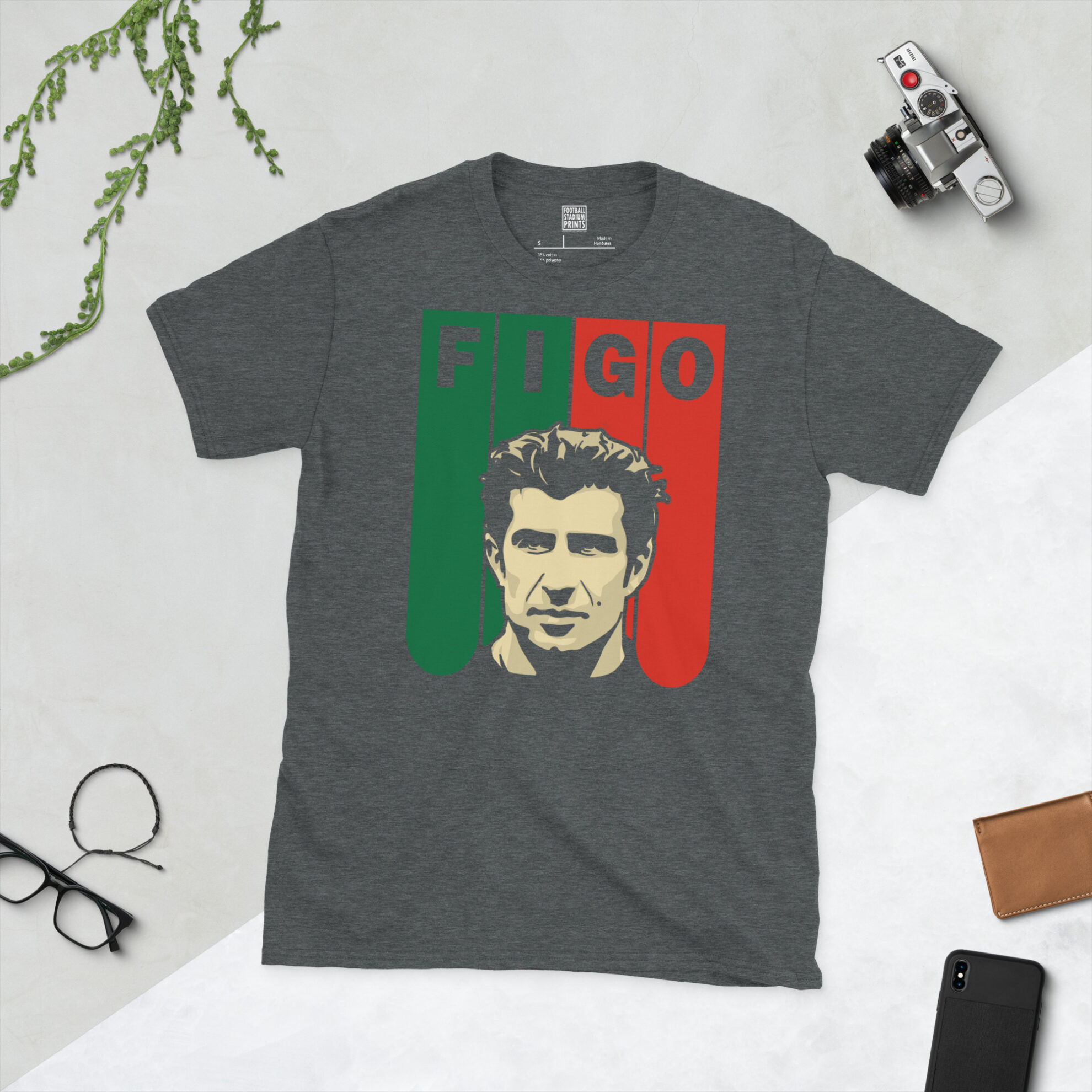 A dark heather grey T-shirt with a retro-style graphic of Luís Figo in front of green and red vertical stripes, celebrating his career with Portugal.